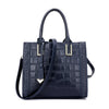 crocodile leather handbag